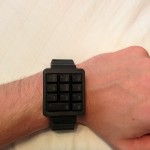 10 - Looks like a numeric keypad Press any button and the numbers flash in an order that indicates the time