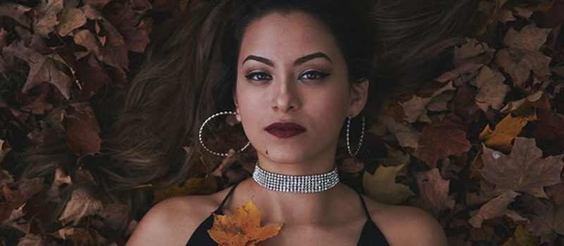 Everything You Need To Know About a Choker Necklace Girl wearing choker necklace in leaves