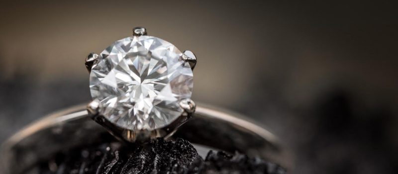 GIT Urges Consumers to Buy Certified Diamonds from Renowned Labs Certified thai diamond ring on piece of coal